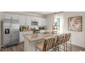 Modern kitchen with granite countertops and stainless steel appliances at 145 Scenic Rock Dr, Youngsville, NC 27596