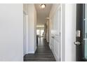 Light-filled entry hall with hardwood floors and neutral-toned walls at 214 Deodora Ln, Cameron, NC 28326