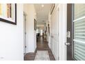 Bright and airy entryway with hardwood floors and access to other rooms at 214 Deodora Ln, Cameron, NC 28326