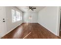 Spacious living room with hardwood floors and natural light at 902 Cobb Ct, Sanford, NC 27330