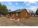 Log cabin with stone walkway and deck at 1018 Lakeview Dr, Cedar Grove, NC 27231