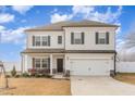 Charming two-story home with attached two-car garage, front porch, and neutral siding with black shutters at 108 Bonnie Girl Ct, Lillington, NC 27546