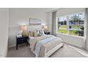 Cozy bedroom with large window, neutral decor, and ample natural light at 1113 Middlecrest Dr, Rocky Mount, NC 27804