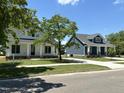 Two new construction homes, one white and one blue at 211 W Harnett St, Dunn, NC 28334