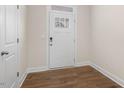 Bright and airy entryway with wood-look flooring at 317 Umstead St, Sanford, NC 27330