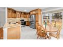 Spacious kitchen with granite countertops and stainless steel appliances at 521 N Franklin Dr, Sanford, NC 27330