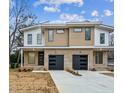 Modern two-story townhome with attached garage and landscaping at 808 Culpepper Ln, Raleigh, NC 27610