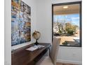 Home office features wood desk and window overlooking street at 808 Culpepper Ln, Raleigh, NC 27610