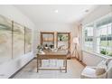 Bright home office with large windows and ample natural light at 197 Paper Birch Way, Fuquay Varina, NC 27526