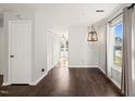 Dining room with hardwood floors and an open layout at 3125 Quinley Pl, Raleigh, NC 27604