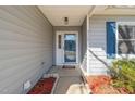 Front door entrance with glass door and welcome mat at 3125 Quinley Pl, Raleigh, NC 27604