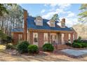 Another view of the brick house, showcasing its architecture at 1015 Mulberry Rd, Clayton, NC 27520