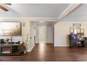 Bright hallway with hardwood floors, leading to bathroom and other rooms at 1508 Carroll Heights Rd, Zebulon, NC 27597