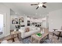 Open-concept living space flowing into a well-equipped kitchen, perfect for modern living at 3854 Well Fleet Drive, Fuquay Varina, NC 27526