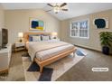 Virtually staged main bedroom with high ceilings and a neutral color scheme at 4109 Mangrove Dr, Raleigh, NC 27616