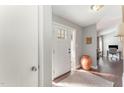 Bright entryway with white door and terracotta pot at 1304 Rothes Rd, Cary, NC 27511