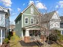 Two story craftsman home with a large backyard and mature trees at 2260 Dunlin Ln, Raleigh, NC 27614