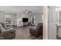 Relaxing living room featuring hardwood floors and plenty of seating at 3422 Kernstown Dr, Raleigh, NC 27610