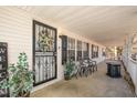 Inviting front porch decorated with plants and seating area, perfect for relaxing at 5141 Nc-39 N Hwy, Henderson, NC 27537