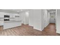 Open concept kitchen with island and stainless steel appliances at 7611 Michelle Rd, Rocky Mount, NC 27803