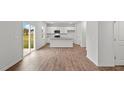 Open concept kitchen with island and stainless steel appliances at 7611 Michelle Rd, Rocky Mount, NC 27803