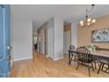 Bright and airy entryway with hardwood floors and view to dining area at 7860 Silverthread Ln, Raleigh, NC 27617