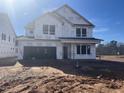 New construction home with house wrap still on at 246 Tidal Pool Way, Cary, NC 27519