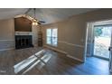 Living room with fireplace and hardwood floors at 248 Southgate Dr, Garner, NC 27529