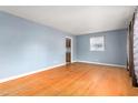Hardwood floors and light blue walls in living room at 2581 Hyde St, Burlington, NC 27217