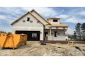 New two-story home under construction showcasing architectural design details and future curb appeal at 371 Springtooth Dr, Zebulon, NC 27597