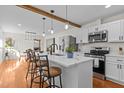 Modern kitchen with stainless steel appliances and a large island at 420 Nelson St, Durham, NC 27707