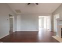 Inviting living area offering wood floors, recessed lighting, and easy access to other rooms at 119 Lippizanner Pl, Zebulon, NC 27597
