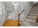 Hardwood floors and a staircase leading to the second floor at 4532 Malvern Rd, Durham, NC 27707