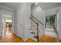 Hardwood floors and a staircase leading to the second floor at 4532 Malvern Rd, Durham, NC 27707