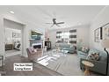 Bright living room with fireplace, neutral colors, and ample seating, perfect for relaxing or entertaining at 612 Sweet Pine Ln, Knightdale, NC 27545