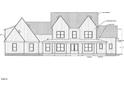 Detailed front elevation showcases the home's design with a welcoming porch and classic architectural elements at 975 Wilbon Rd, Holly Springs, NC 27540