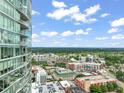 Incredible aerial view from the condo showing trees, buildings, and sky at 110 N Corcoran St # 2304, Durham, NC 27701
