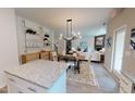 Open-concept living space with modern decor, dining area, and seamless flow at 1105 Freestone Rd, Durham, NC 27703