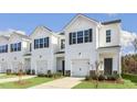 Beautiful street view of a neighborhood with well-maintained lawns and sidewalks at 204 Starlight St, Sanford, NC 27330