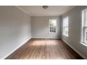 A bedroom with natural light, and neutral walls and flooring at 3 Azzi Ct, Durham, NC 27703