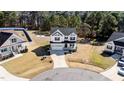Beautiful home from an aerial view, highlighting its spacious yard and inviting neighborhood setting at 99 Bodacious Ln, Benson, NC 27504