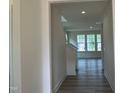 Bright foyer showcasing beautiful flooring and natural light at 107 Willow Cameron Way, Angier, NC 27501