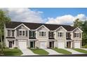 Row of townhomes featuring individual garages and well-maintained front yards, great for curb appeal at 212 Starlight St, Sanford, NC 27330