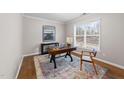 Cozy home office with natural light, hardwood floors, and stylish decor at 5618 Wade Park Blvd, Raleigh, NC 27607