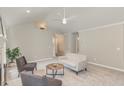 Open living space with a ceiling fan, neutral decor, and an airy feel at 904 Amersham Ln, Wake Forest, NC 27587