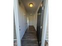 Inviting entryway with dark wood-look flooring and neutral walls at 208 Bruce Dr Dr, Dunn, NC 28334