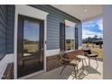 Inviting front porch with seating area and views at 68 Victory View Ter, Smithfield, NC 27577