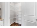 Walk-in pantry features wire shelving for ample and organized storage space at 907 Field Ivy Dr, Fuquay Varina, NC 27526