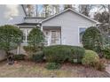 View of well-maintained property featuring a cozy front porch at 482 Beechmast, Pittsboro, NC 27312