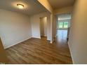 Bright living room featuring hardwood floors and open-concept layout at 106 E Victory View. Ter, Smithfield, NC 27577